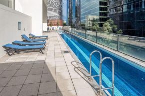 Stylish City Getaway with Pool Gym Parking